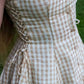 Toasted Crème Custard Dress | Short Sleeve Muslin Mini Dress With Adjustable Side Ties And Wooden Bead Accents