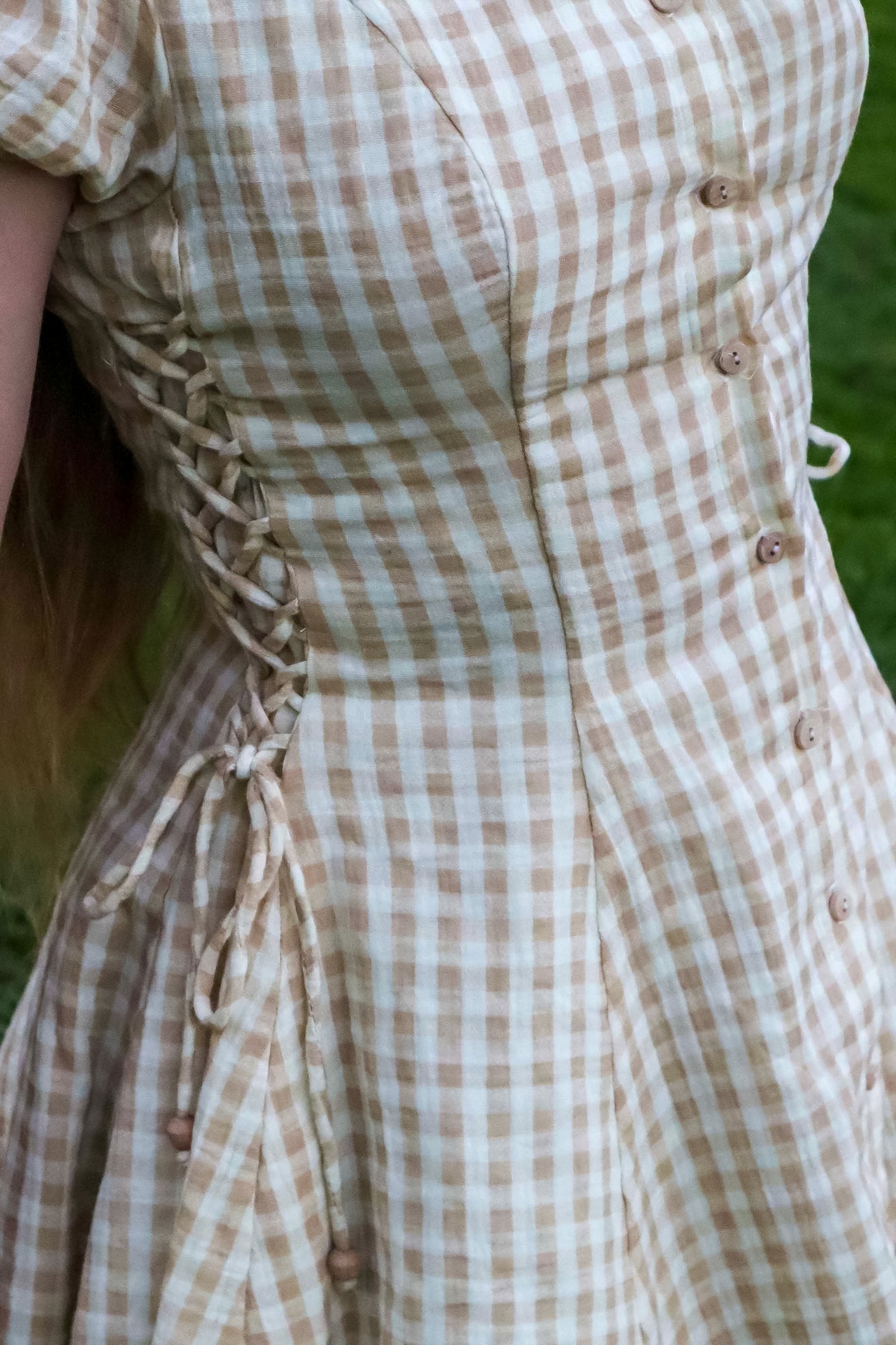 Toasted Crème Custard Dress | Short Sleeve Muslin Mini Dress With Adjustable Side Ties And Wooden Bead Accents